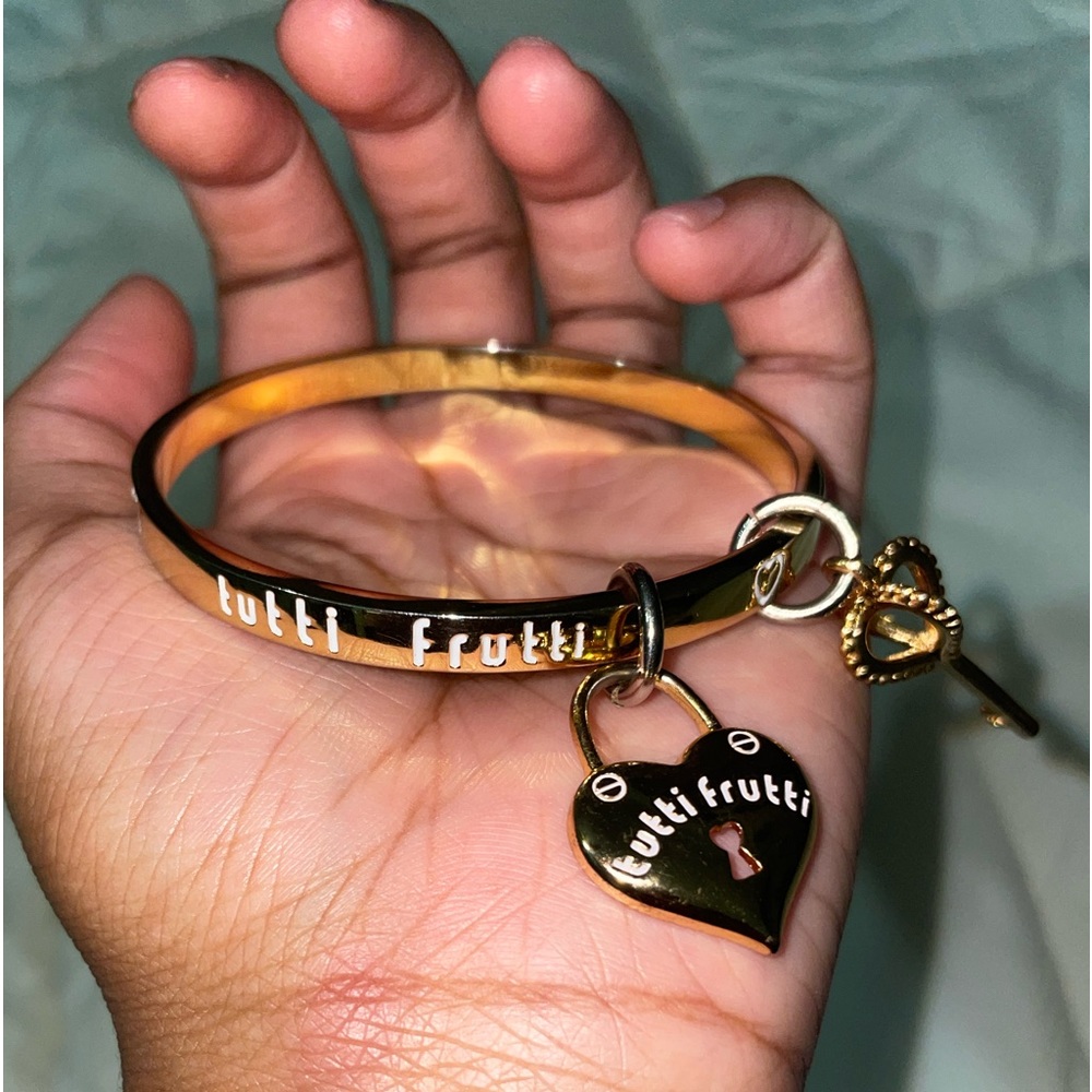 Tutti Frutti Gold tone bangle with charms